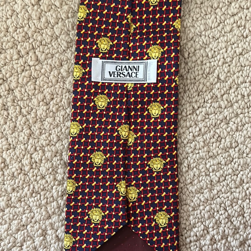 65 Designer Ties, some still include tags. Prices range $80-$300.
